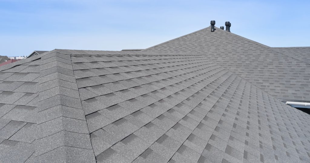 A home with brand-new asphalt shingles.