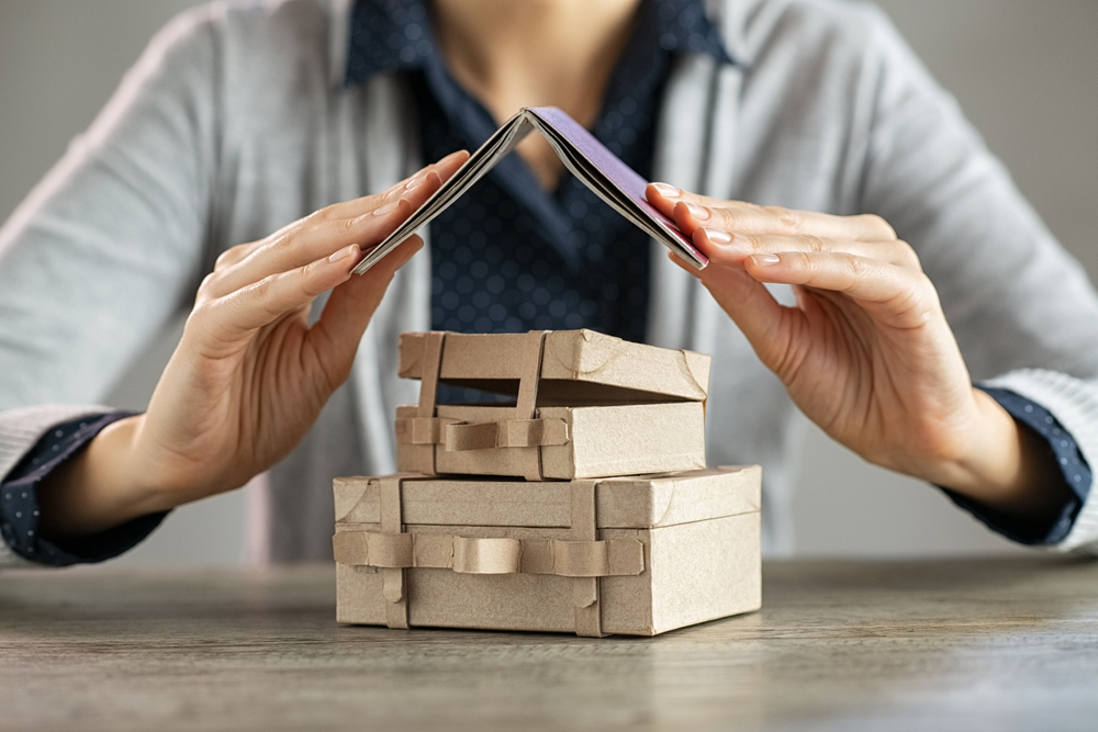 Representation of a roof sheltering the home beneath it in The Woodlands, TX.